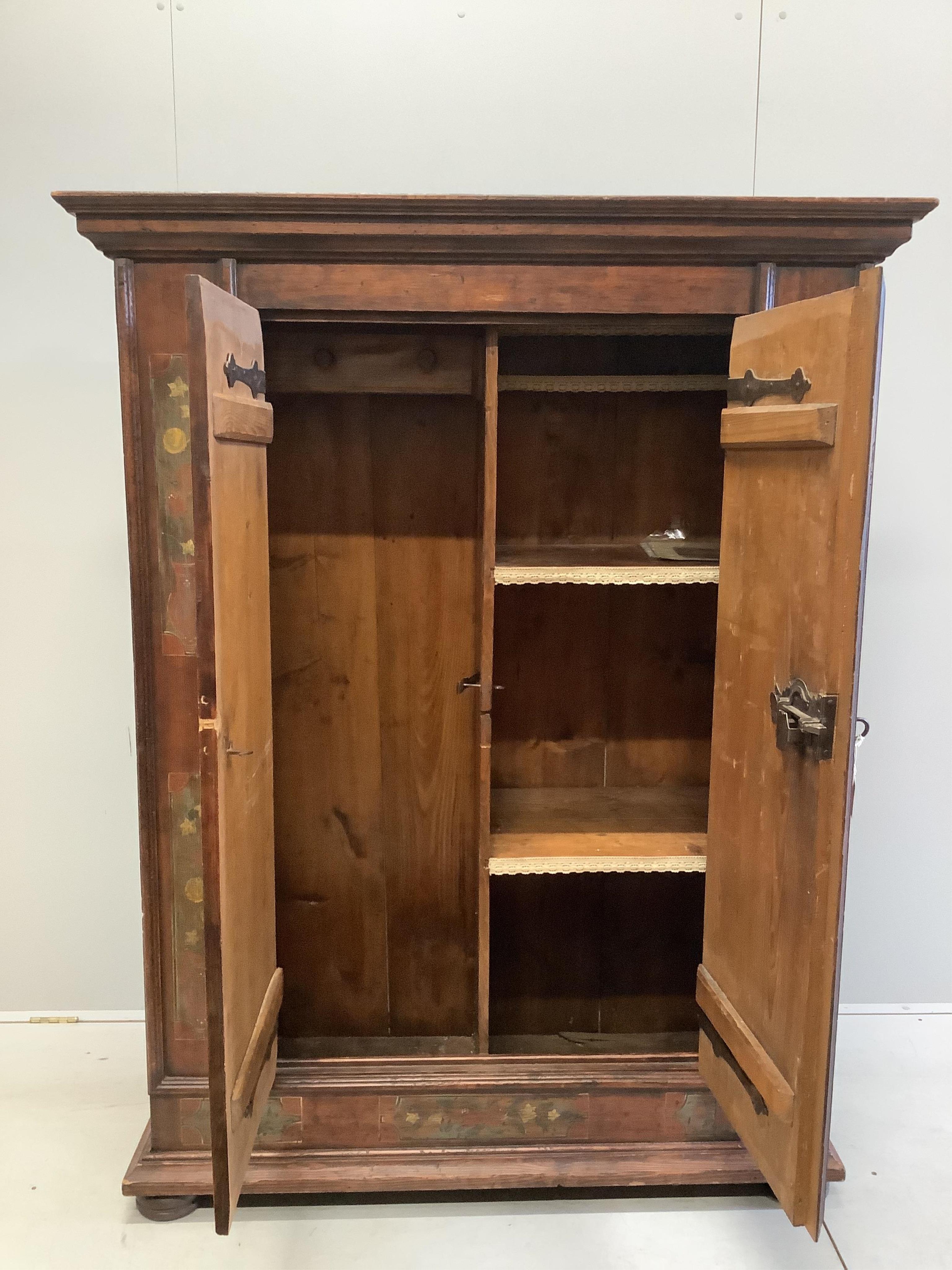 An 18th century Swiss painted pine armoire, width 131cm, depth 54cm, height 169cm. Condition - fair